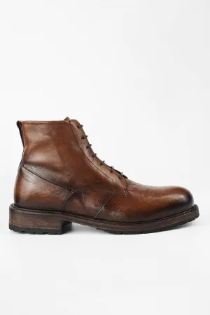 ROWLEY cognac folded lace up boots.